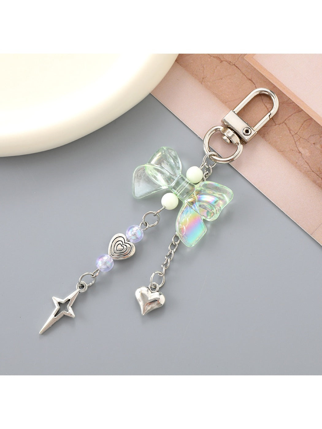 Keypus - Heart Shaped Star Pendant Bow Keychain