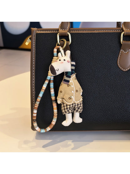 Top view of the giraffe charm keychain highlighting the keyring attachment