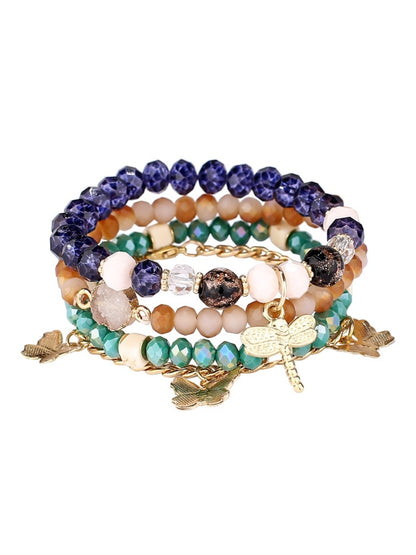 Lovra vintage layered beaded bracelet coiled on a white background