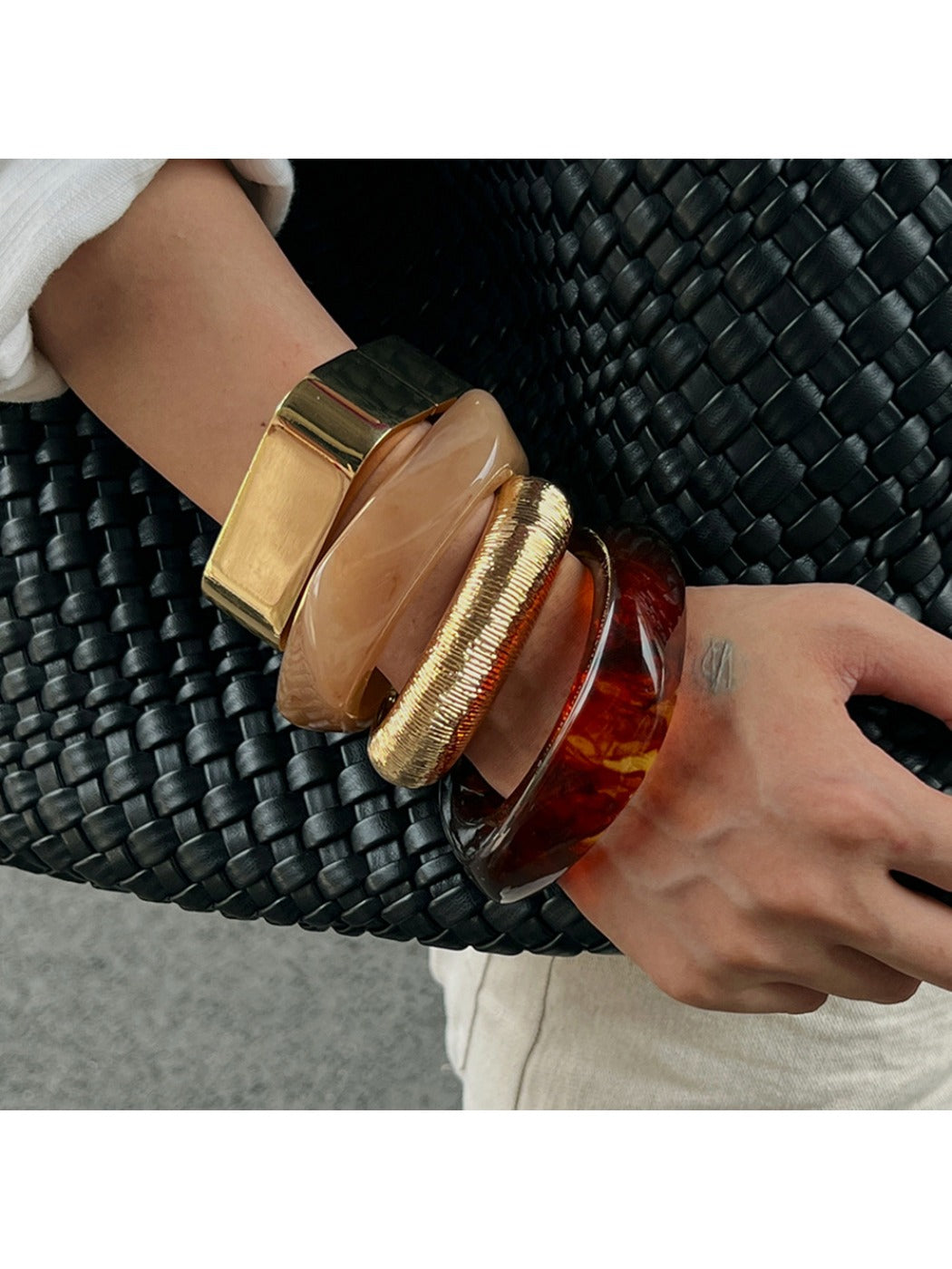 Close-up of Lovra Chic Irregular Bangle Bracelet highlighting textured surface
