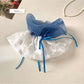 Close-up of Gifty plaid hair scrunchie showing fabric texture and layered design