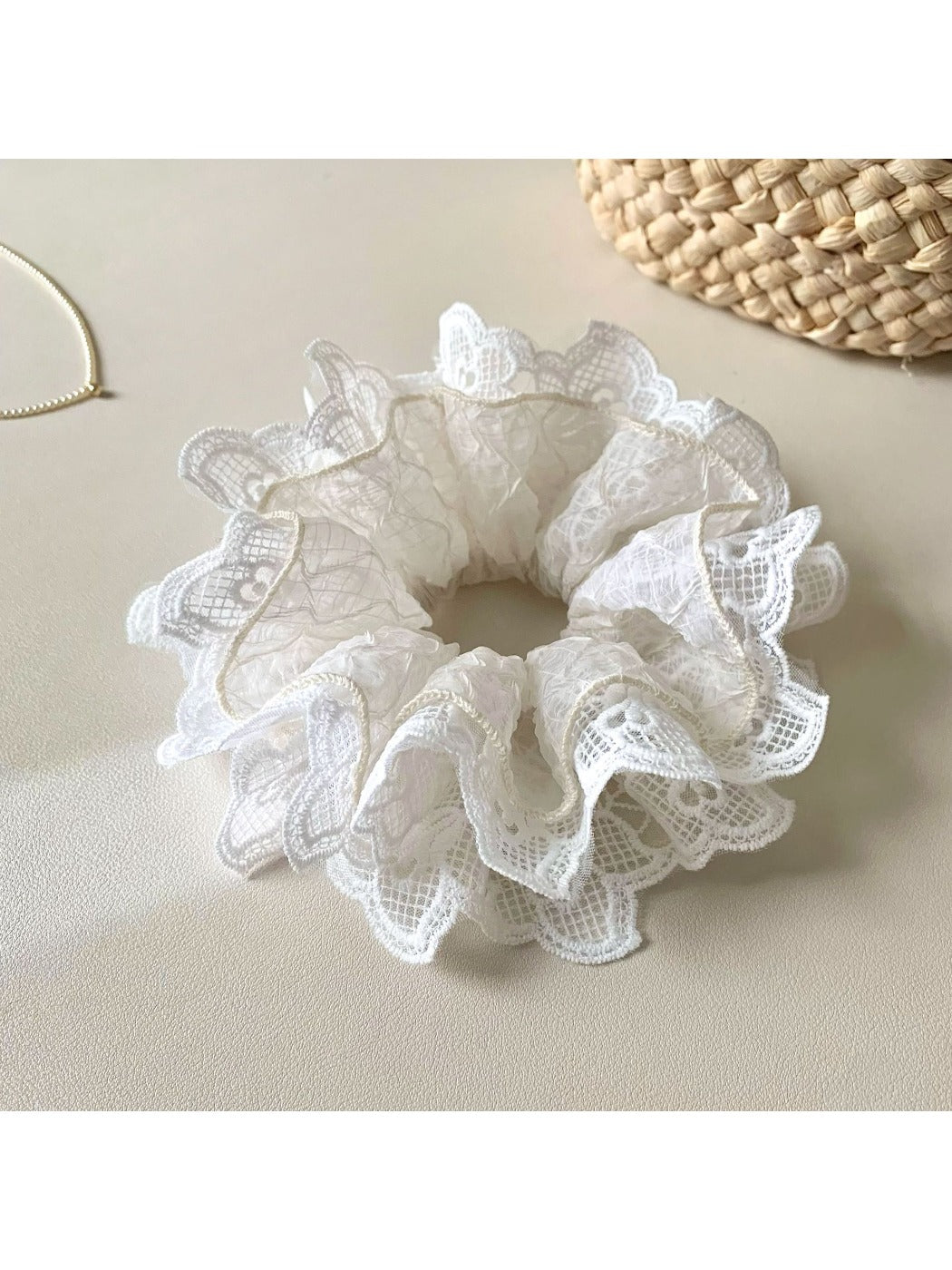 Gifty ruffled scrunchie displayed on a white background showing cutout details