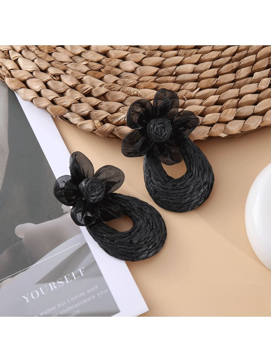 Top view of Sweet Raffia Flower Shaped Stud Earrings highlighting flower design