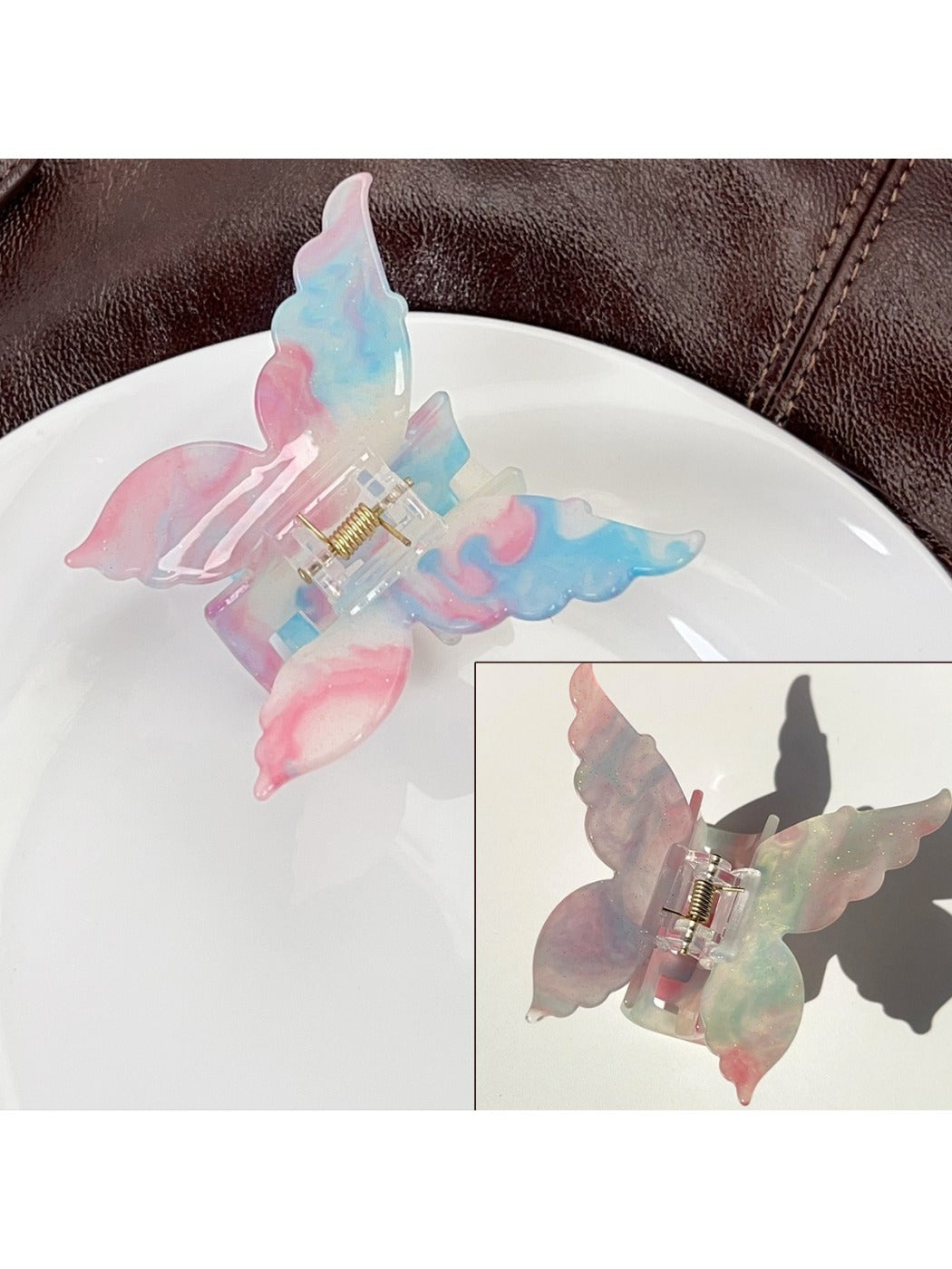 Beau hair claw clip displayed on a wooden surface