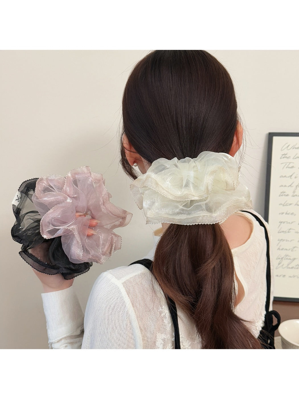 Gifty ruched scrunchie worn on a ponytail showcasing its solid color and texture