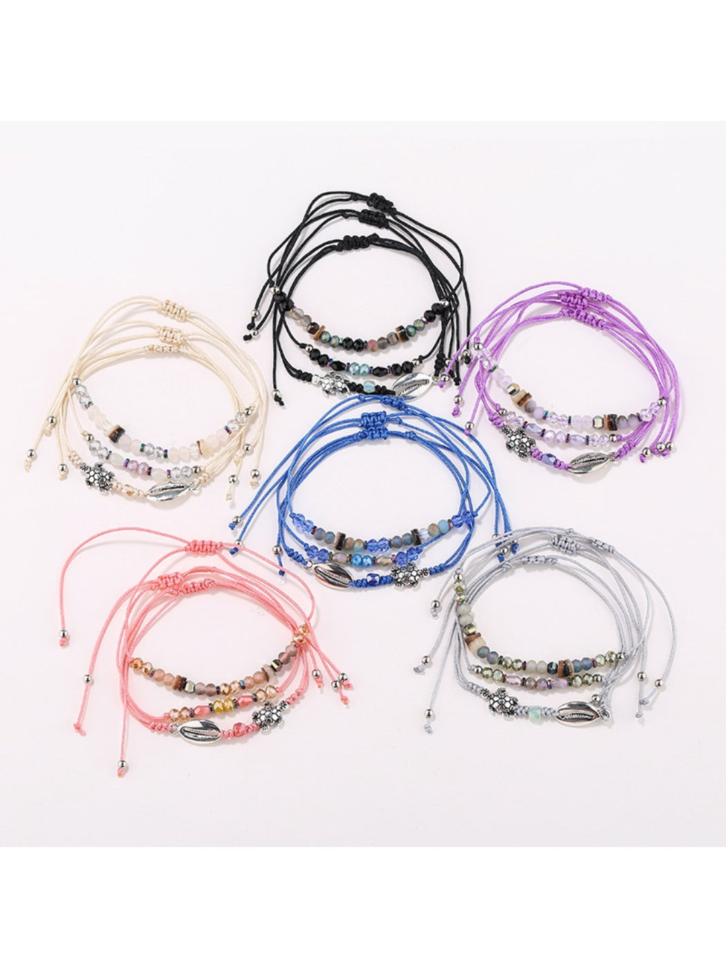 Lovra alloy charm small bead bracelet with silver-tone beads and charm on a white background