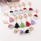 Christmas tree, hat, stocking and Santa face keychains in multiple styles