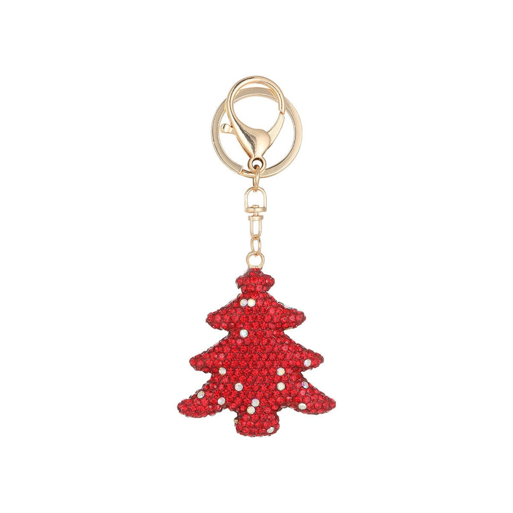 Red Christmas tree keychain on white background