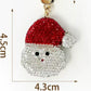 Red Santa face keychain with 4.5 by 4.3 cm dimensions