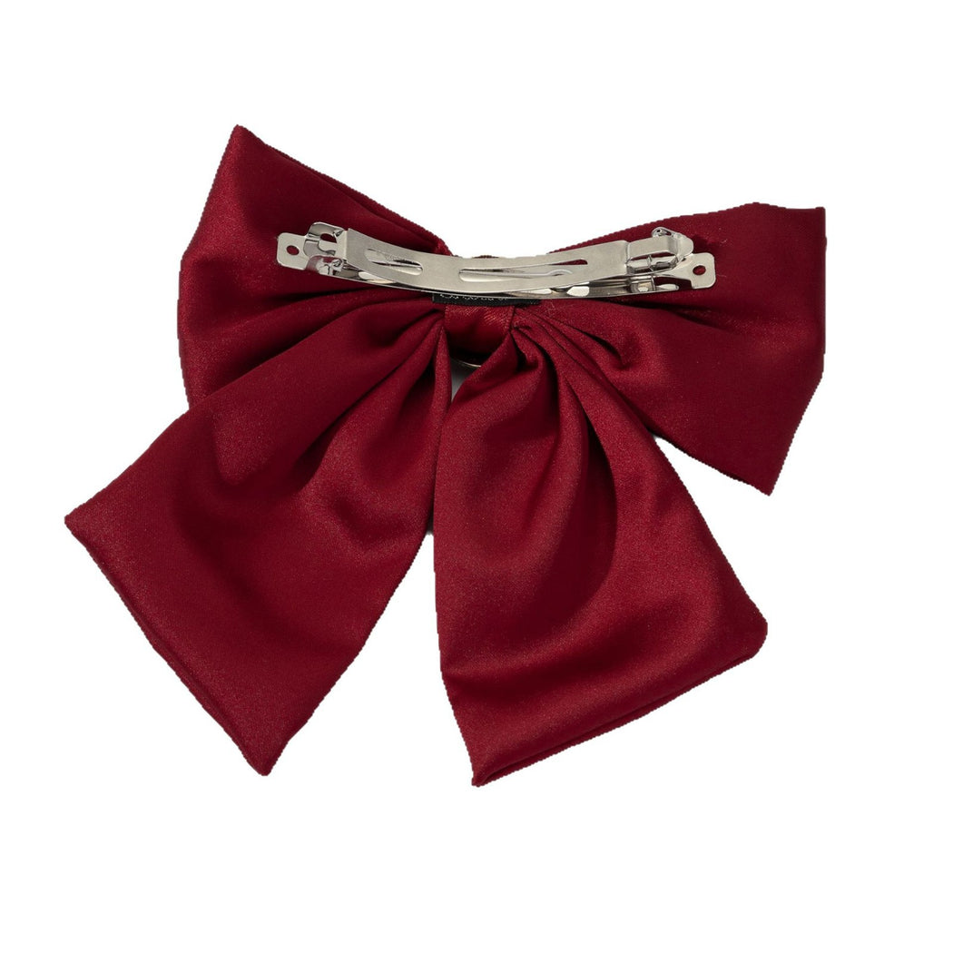Rhinestone bow spring hair clip detail