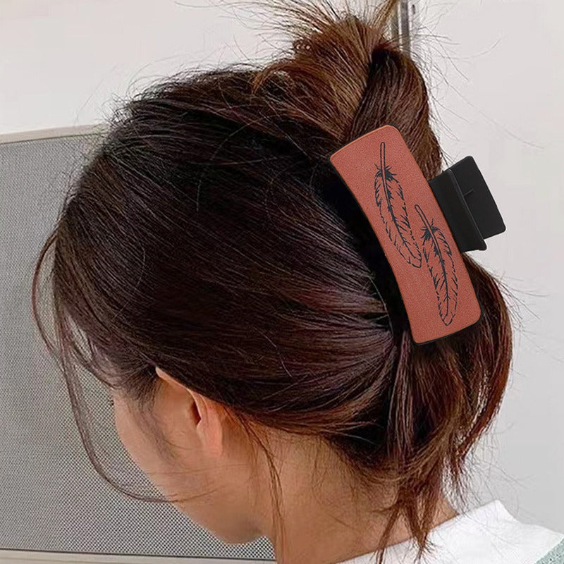 西部牛仔风羽毛牛头皮革女士发夹抓夹鲨鱼夹亚马逊速卖通跨境希音