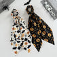 White and black Halloween ribbon scrunchies