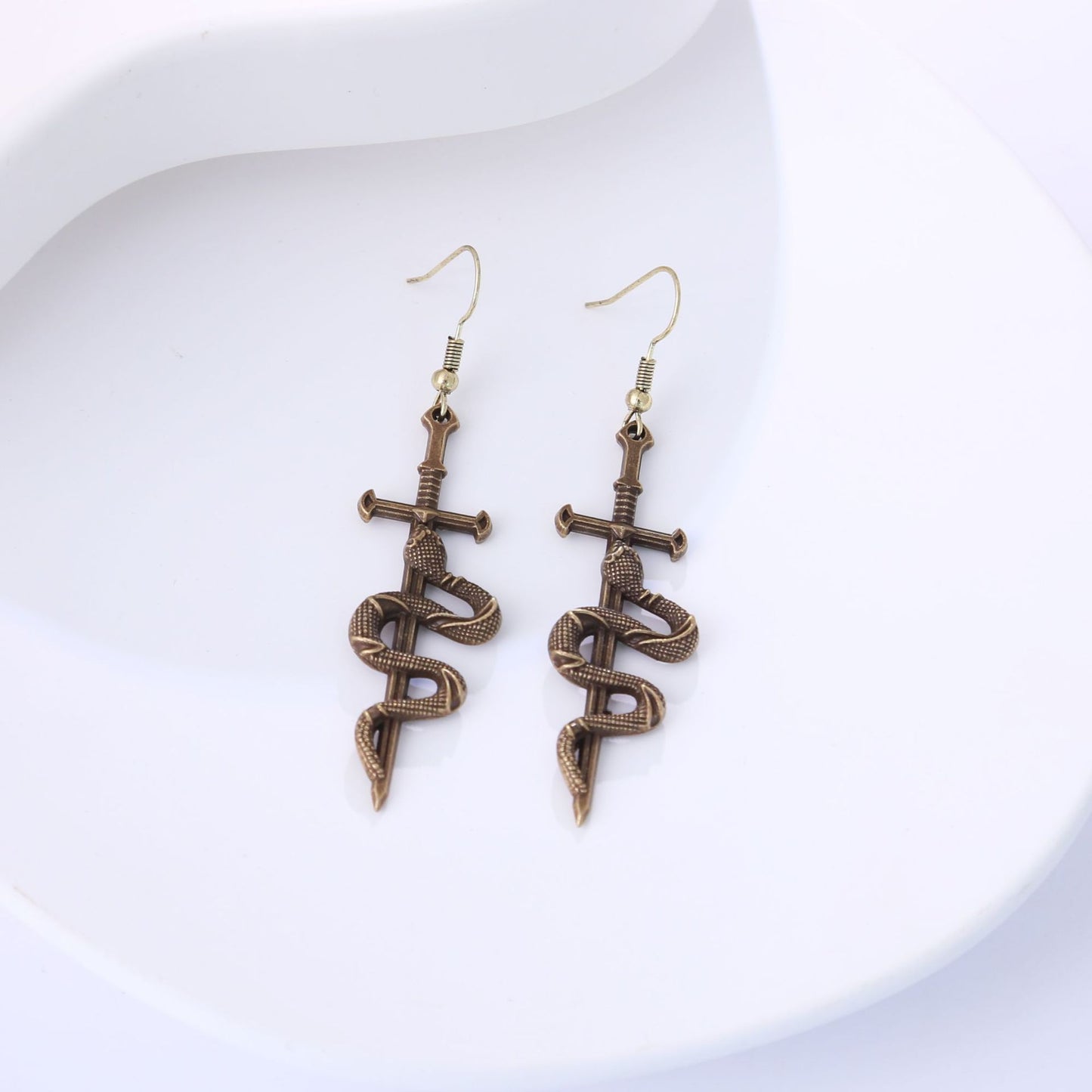Earedge - Snake Wrapped Cross Drop Earrings