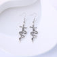 Earedge - Snake Wrapped Cross Drop Earrings