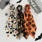 Three Halloween pumpkin ribbon scrunchies