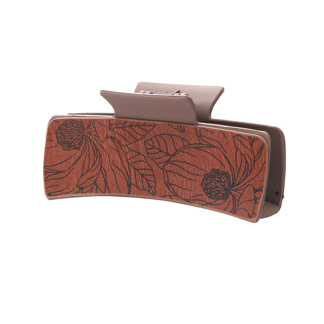 Floral leaf hair claw on white background