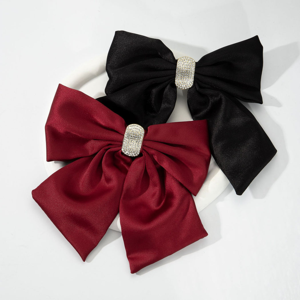 Rhinestone bow spring hair clip profile