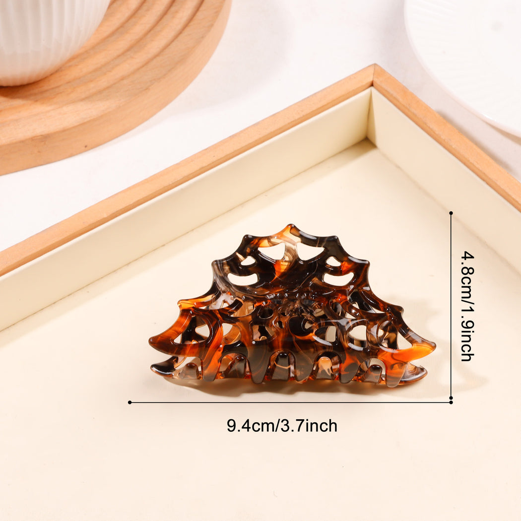 Amber Halloween spiderweb openwork hair claw