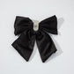 Rhinestone bow spring hair clip styling view
