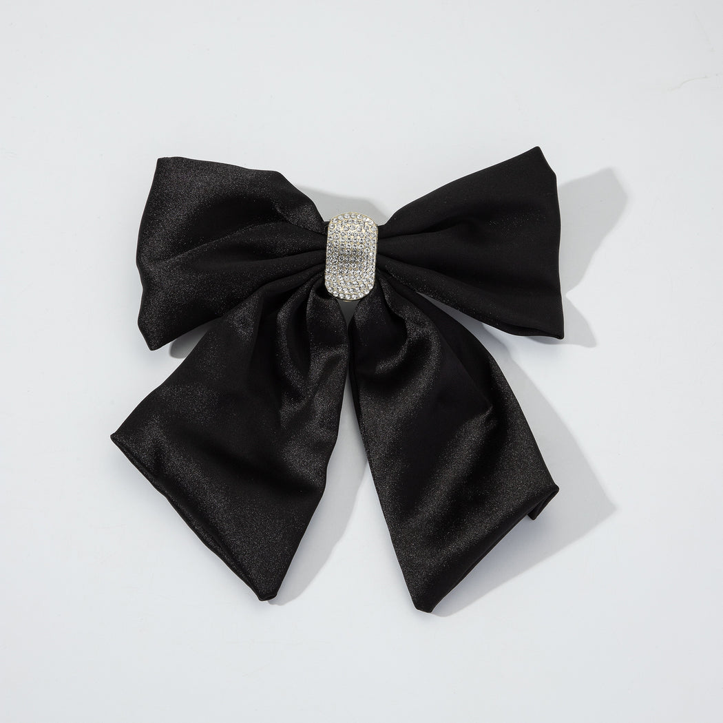 Rhinestone bow spring hair clip styling view