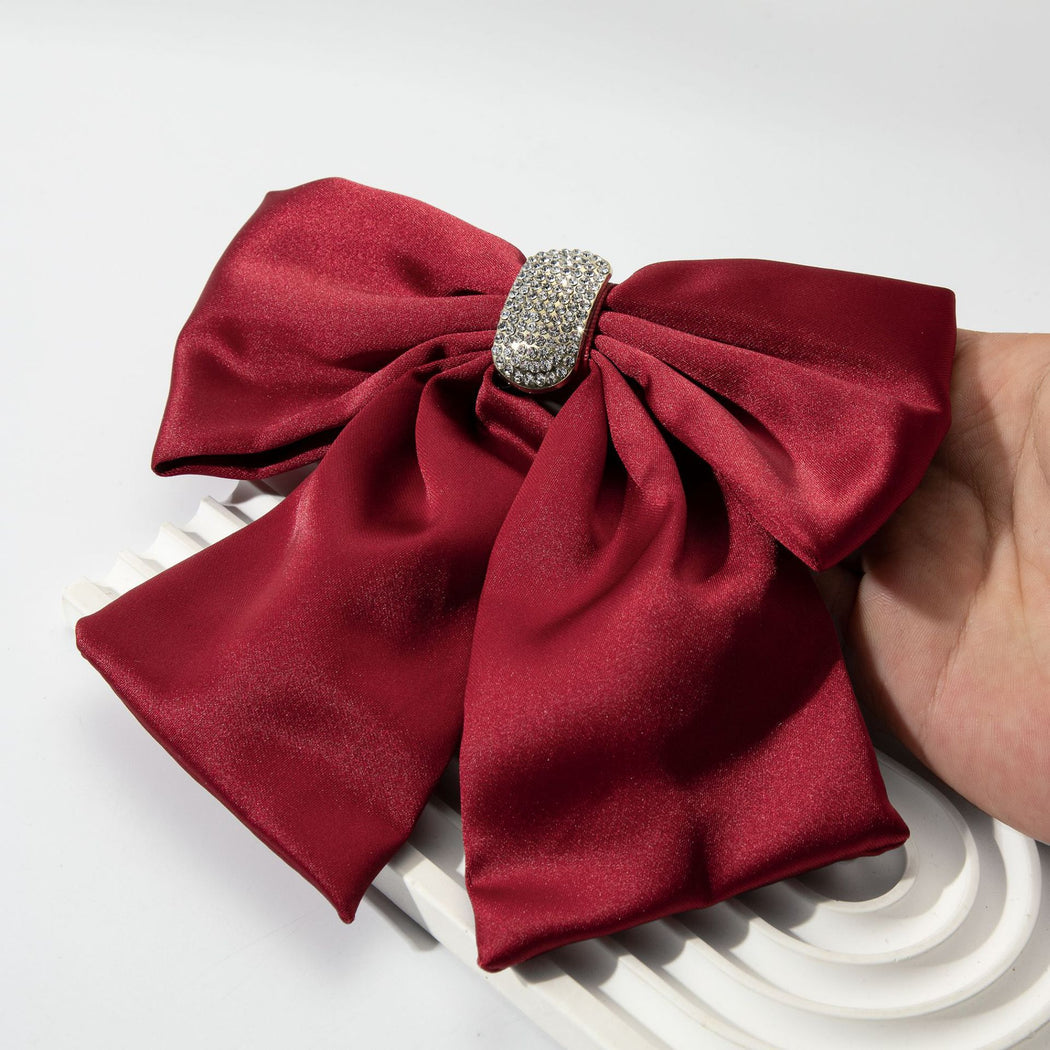 Rhinestone bow spring hair clip construction