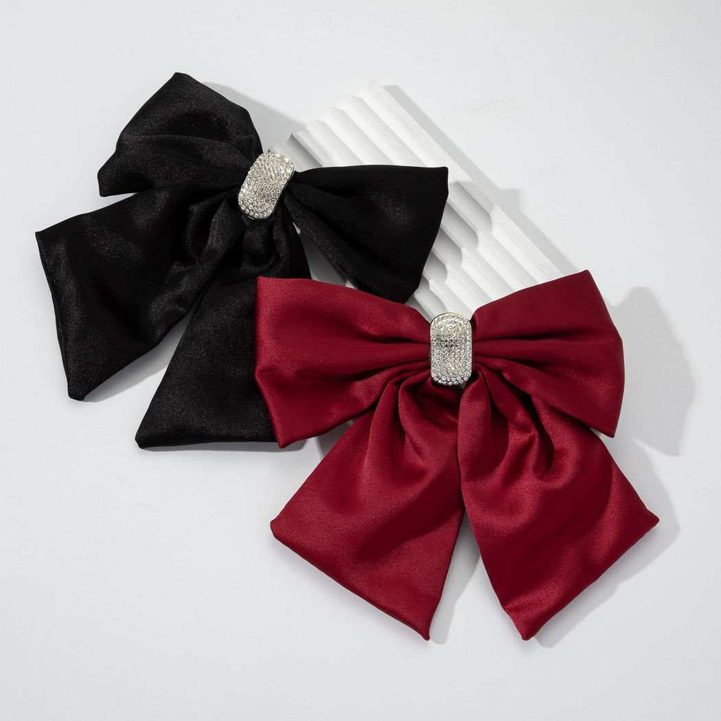 Burgundy and black rhinestone bow spring hair clips