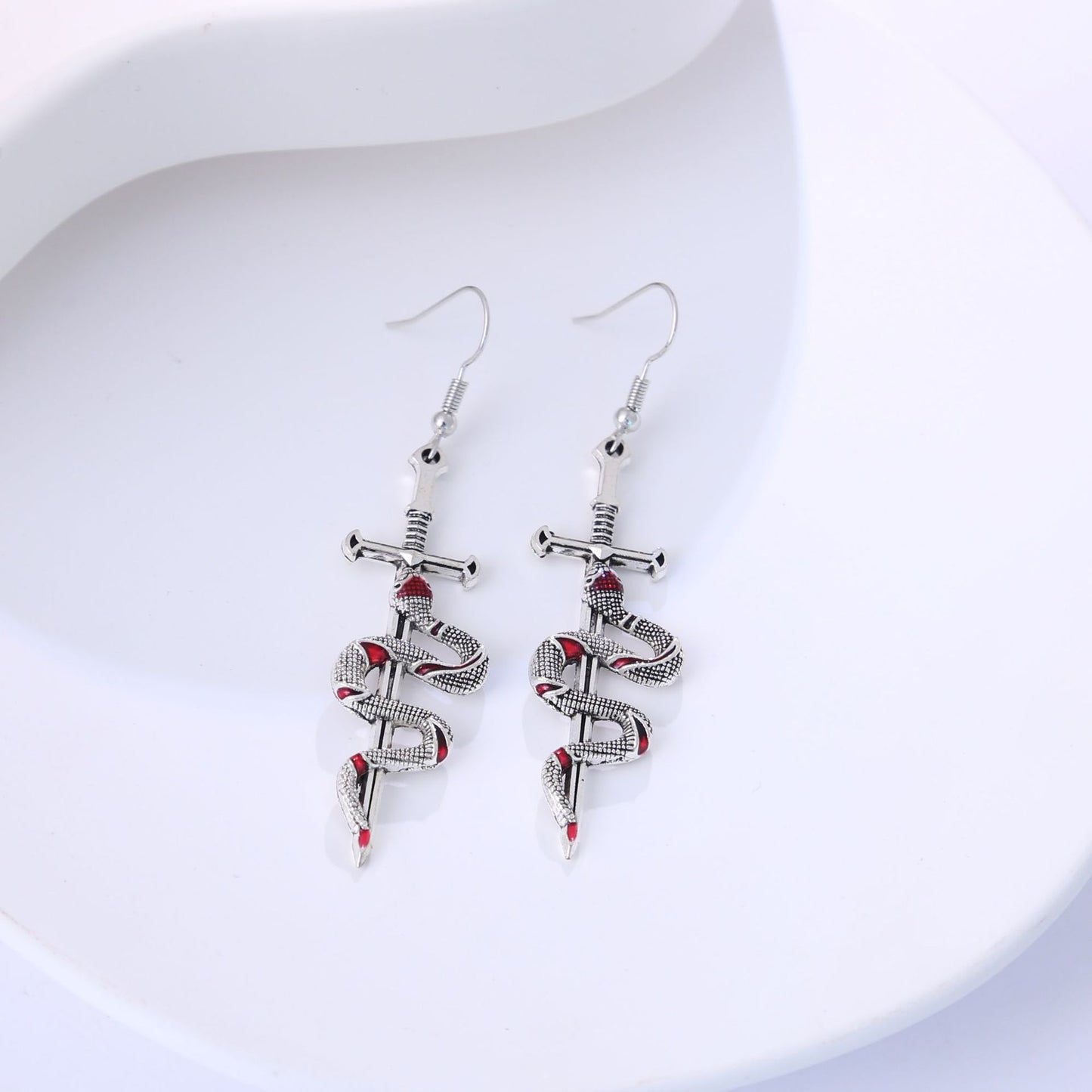 Earedge - Snake Wrapped Cross Drop Earrings