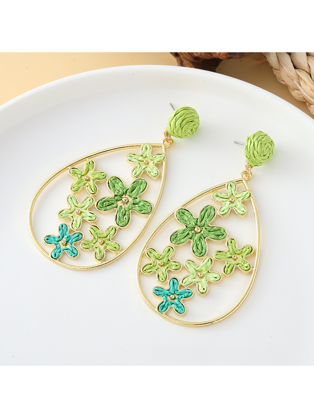 Earedge floral raffia earrings shown from the back to display clasp details