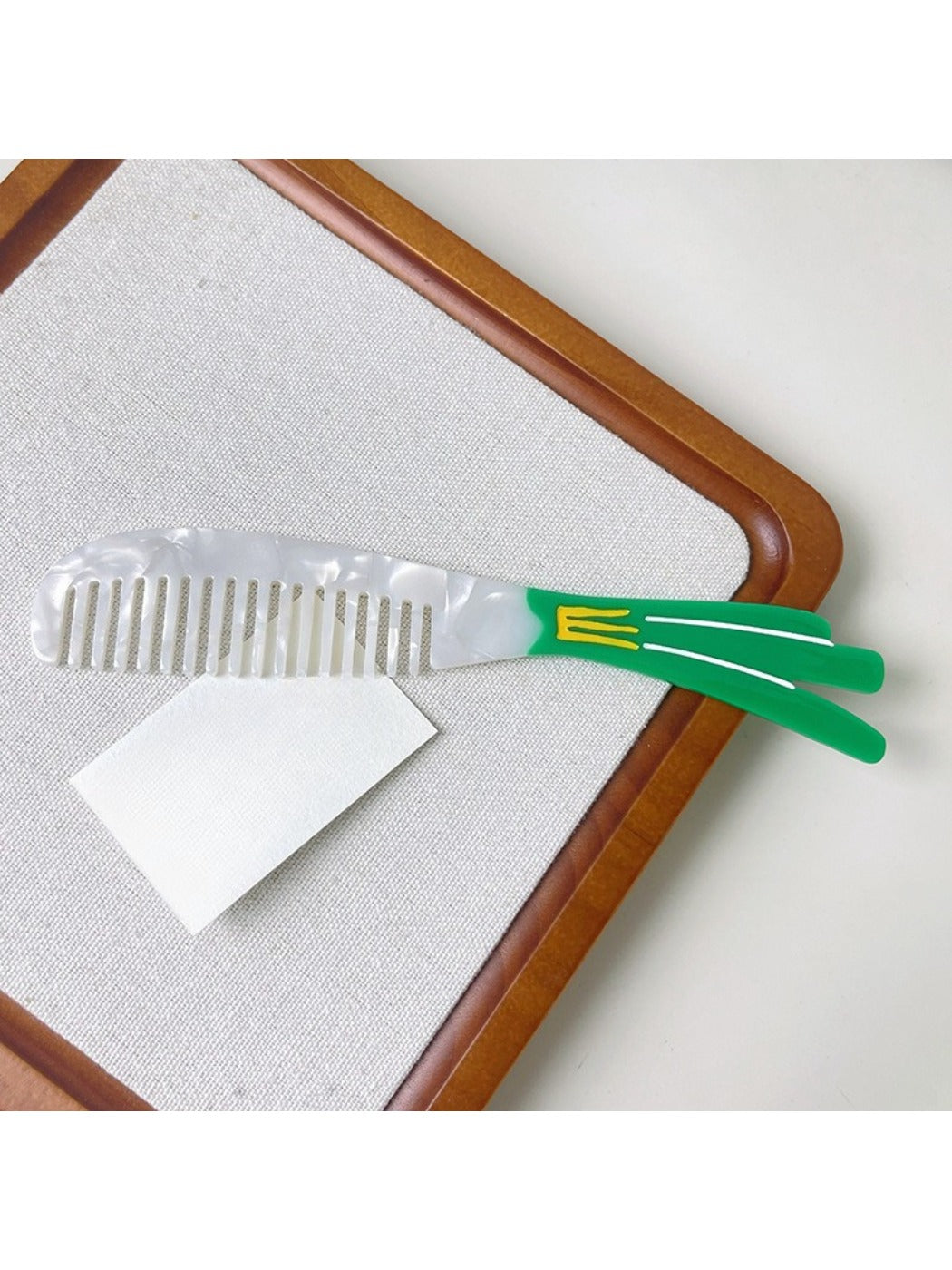 Camerow acetate hair comb angled to show thickness and texture