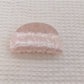 Beau marble pattern claw clip open to show inner clasp and teeth