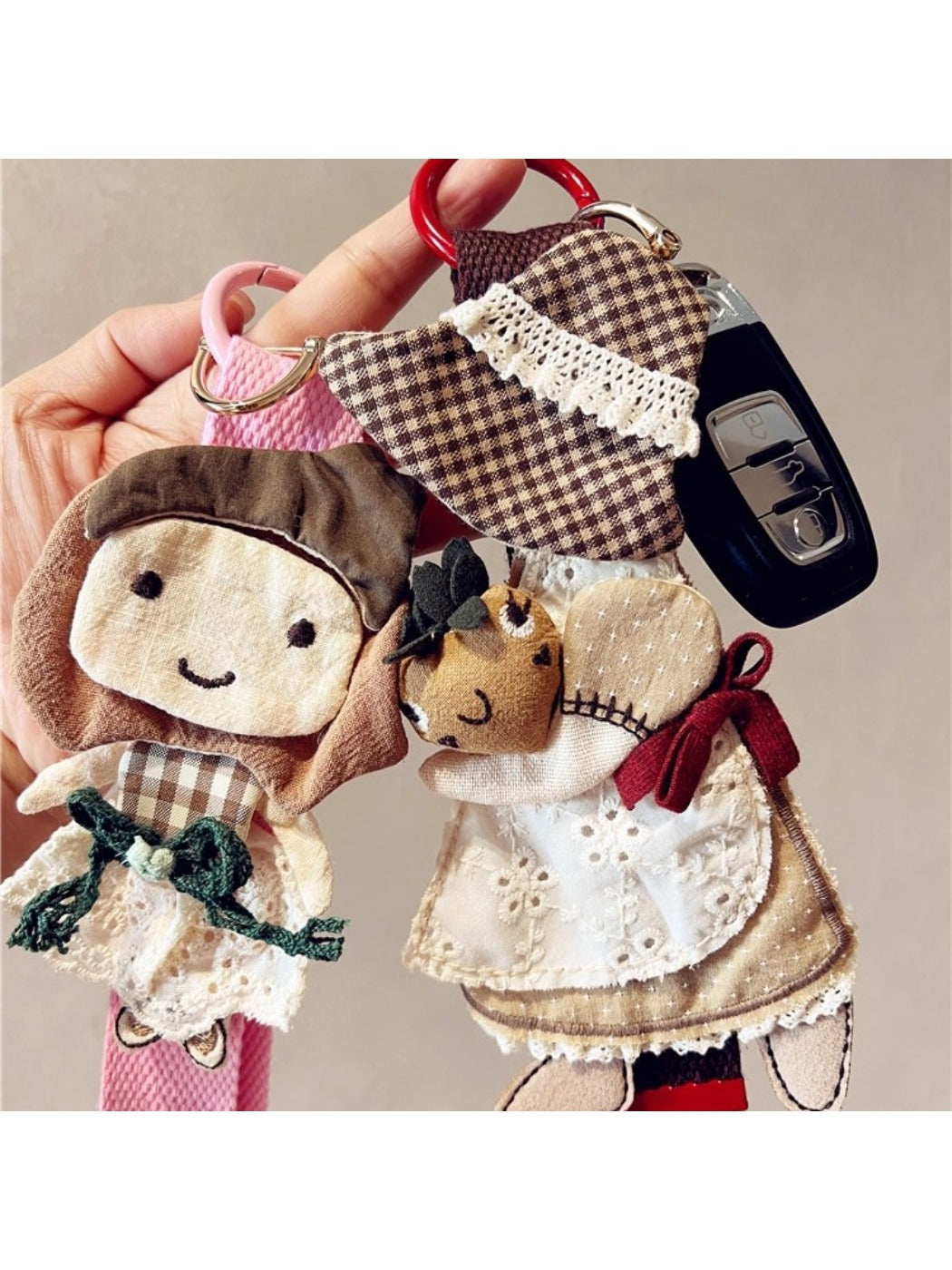 Close-up of Keypus keychain showing detailed fabric patchwork design