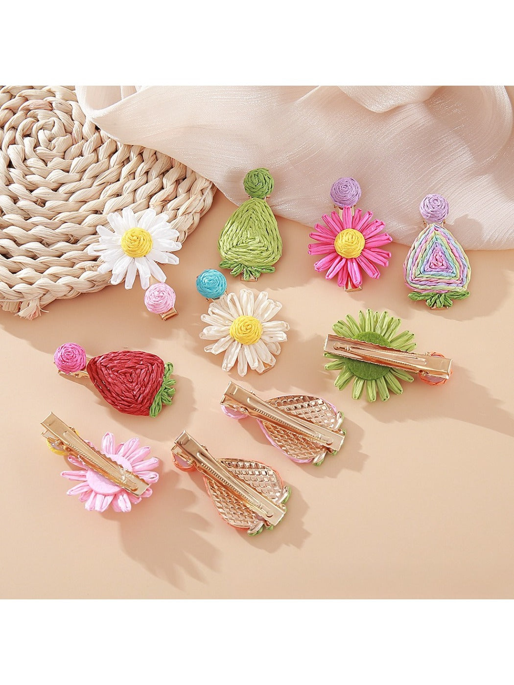 Close-up of Beau raffia strawberry flower hair clip showing woven texture and details