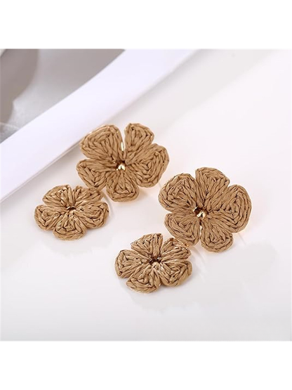 Close-up of the raffia texture on Earedge floral pendant drop earrings