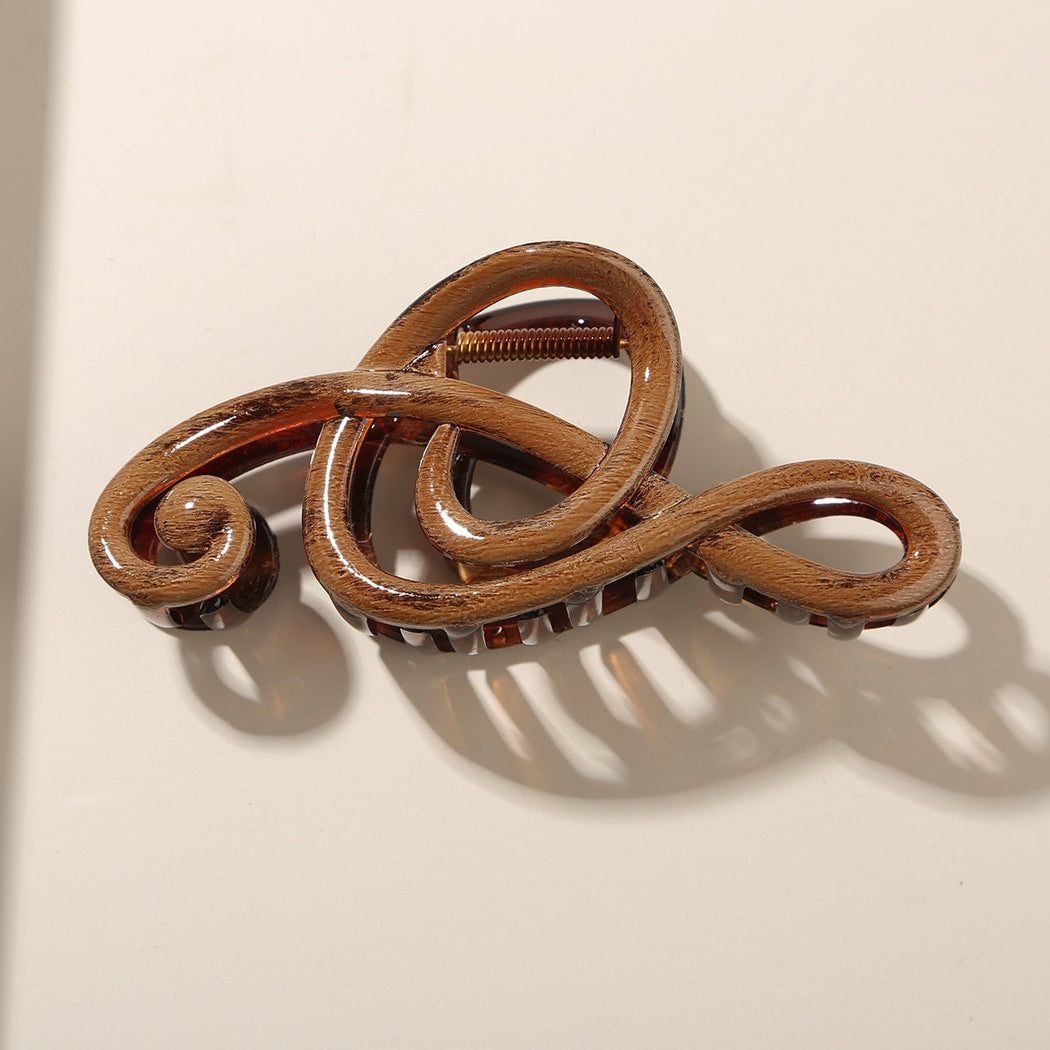 Beau - Glossy PS Curved Hollow Design Claw Clip