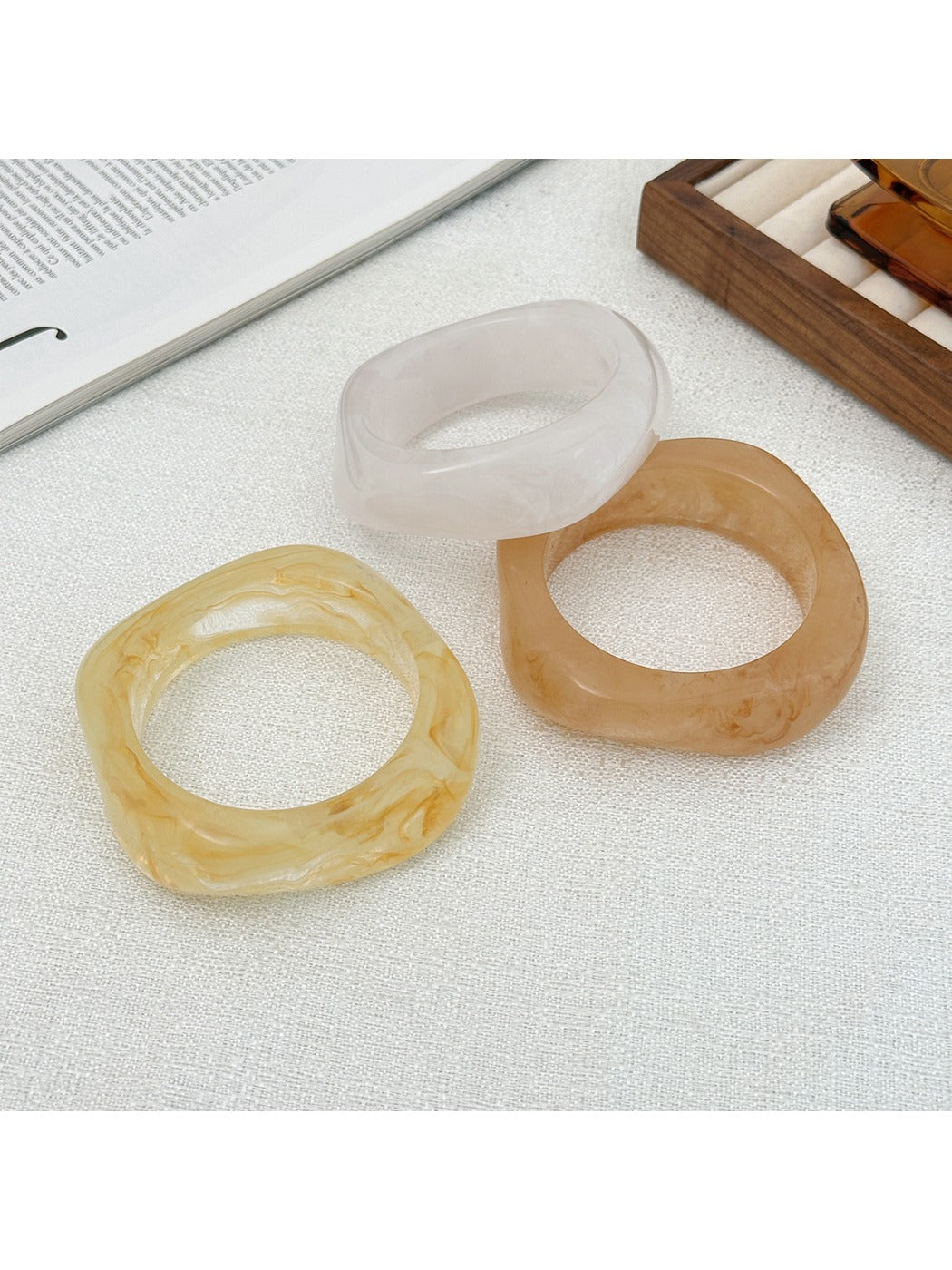 Close-up of Lovra bangle bracelet highlighting its unique irregular shape and smooth finish