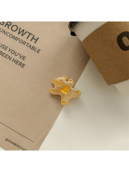 Rose hair clips clipped onto a denim jacket pocket