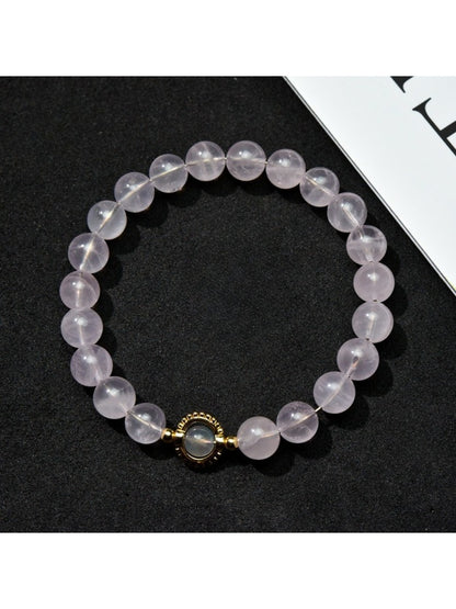 Lovra minimalist pastel beaded bracelet with soft pink and blue beads on a white background