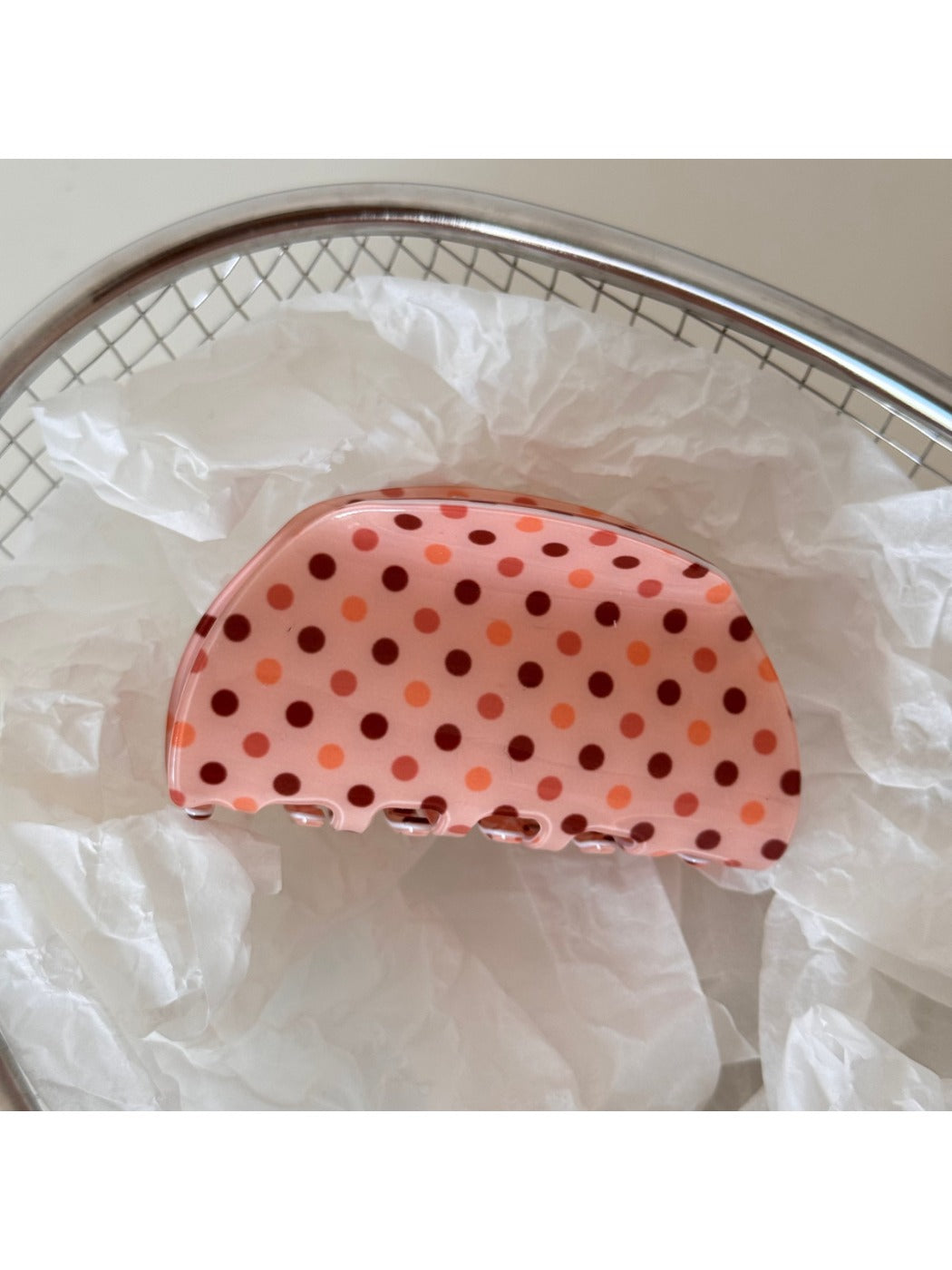 Beau hair clip held in hand to show size and scale
