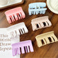 Side view of Beau plastic square claw clip highlighting thickness