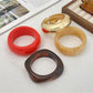 Lovra fashionable round geometric bracelet with gold-tone finish on white background