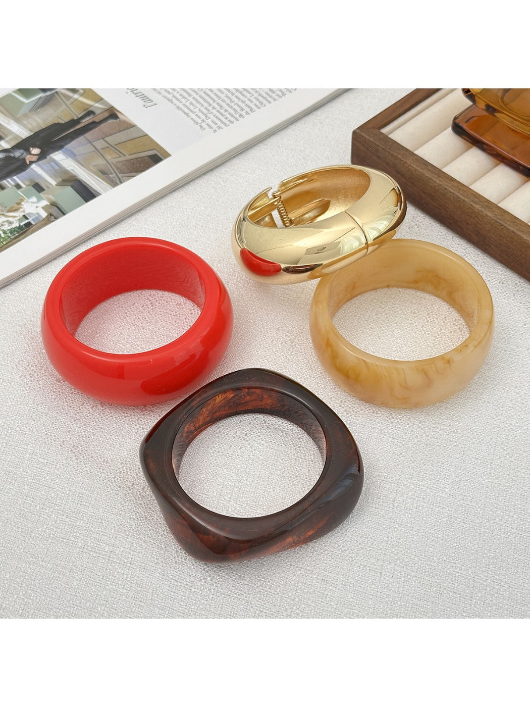 Lovra fashionable round geometric bracelet with gold-tone finish on white background