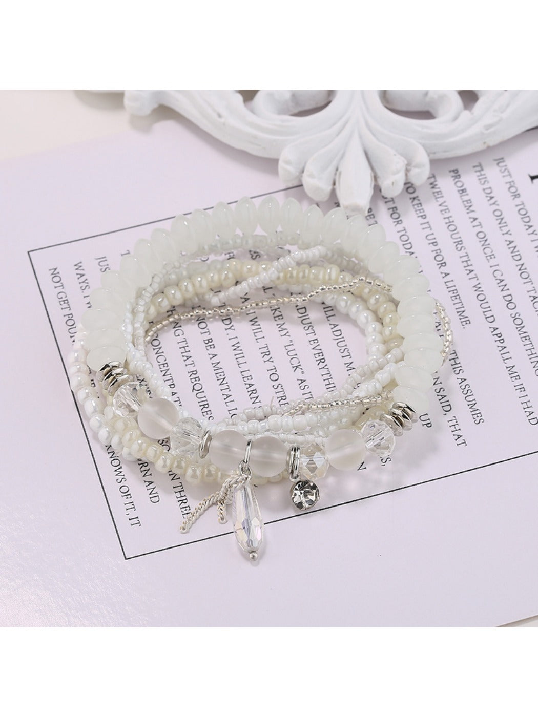 Side view of Lovra beaded bracelet highlighting layered rows and clasp