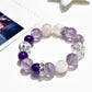 Lovra purple crystal beaded bracelet with silver accents on a white background