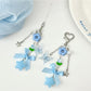 Blue tone flower bow keychain with gold keyring on white background