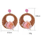 Side view of earedge vintage rattan woven circle earring showing thickness
