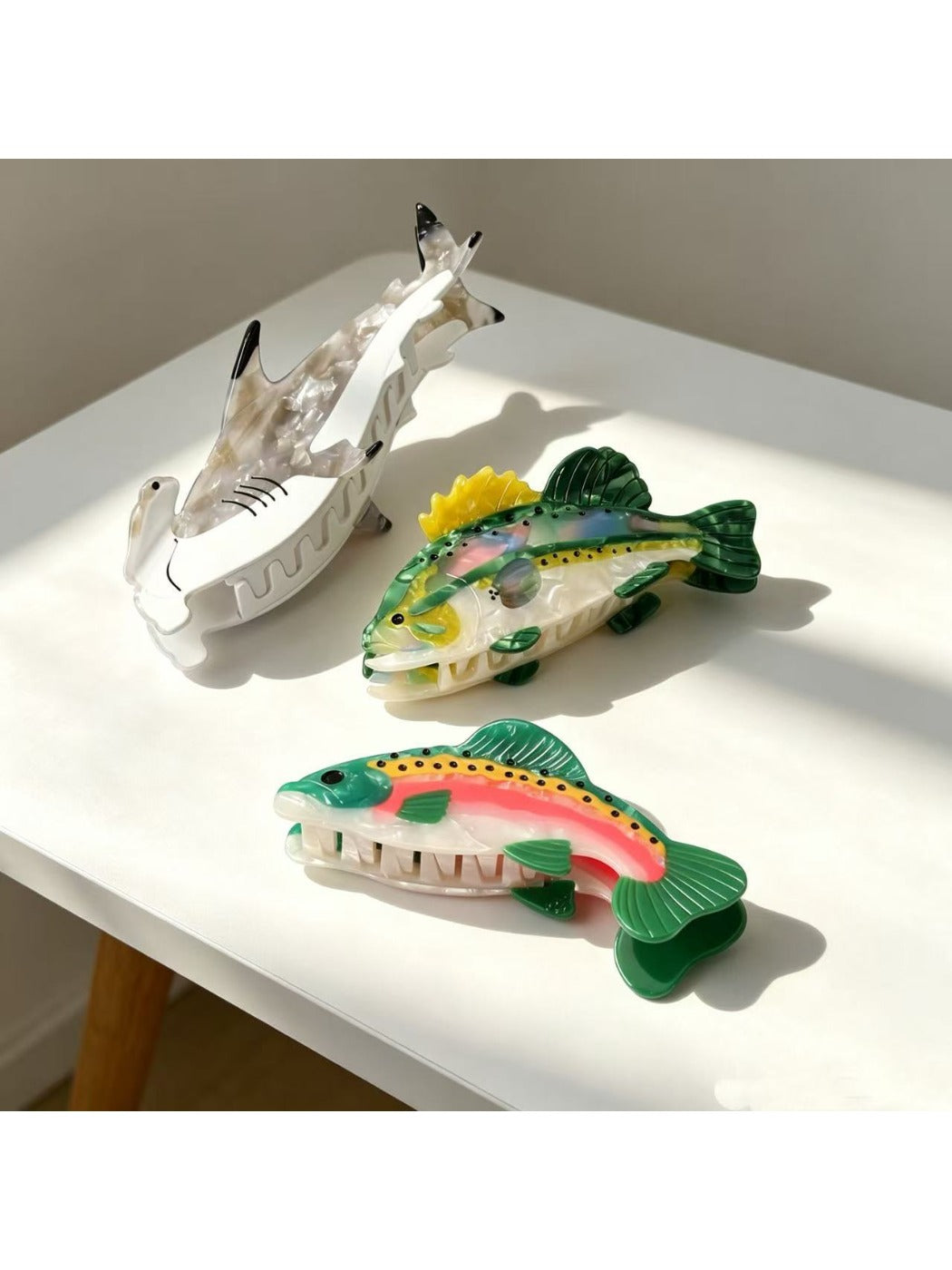 Close-up of Beau fish shape claw clip showing detailed fin design