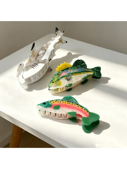 Close-up of Beau fish shape claw clip showing detailed fin design