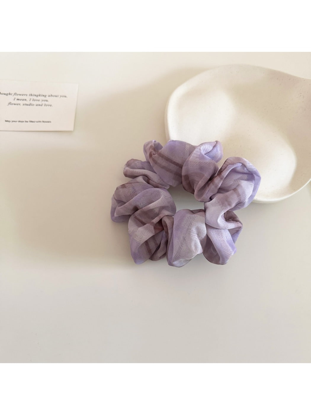 Gifty two tone checkered scrunchie displayed on a white background