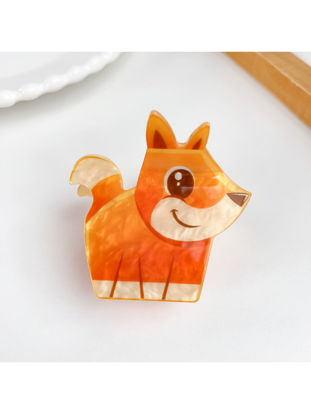Beau hair claw clip shaped like a bear shown from side angle