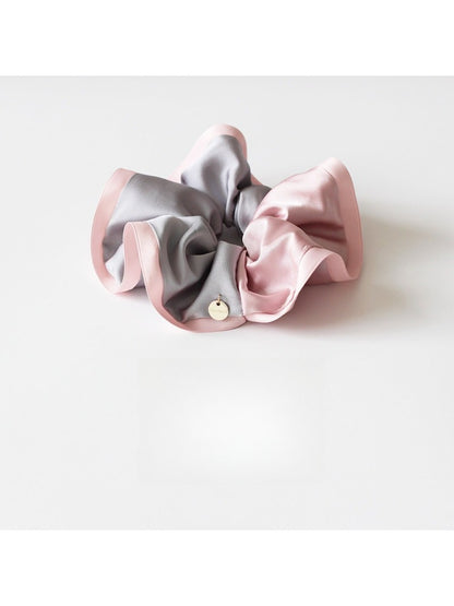 Gifty scrunchie in soft fabric with beige, brown, and cream color blocks